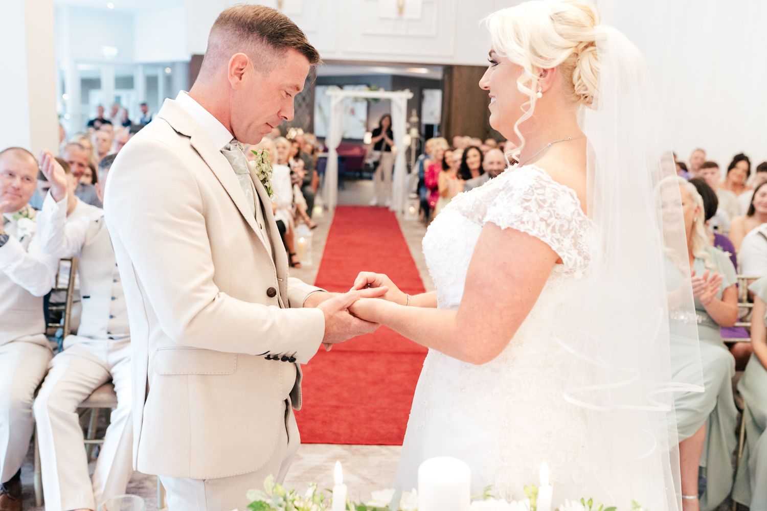 A wedding montage showing celebrations with guests in formal attire at a reception venue.