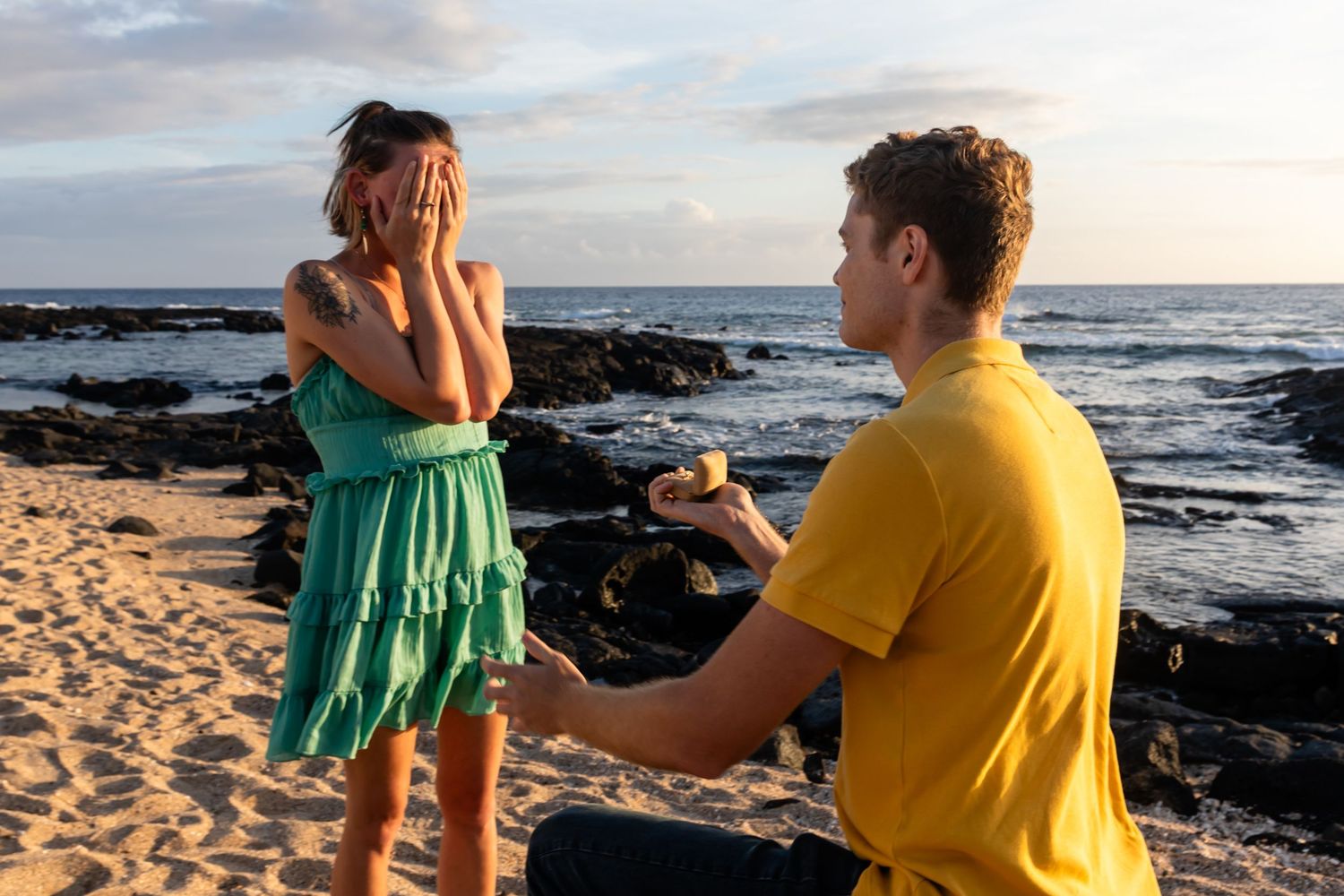 A surprise beach proposal moment with emotional reaction at the Old Airport Beach Park in Kailua Kona, Hawaii.