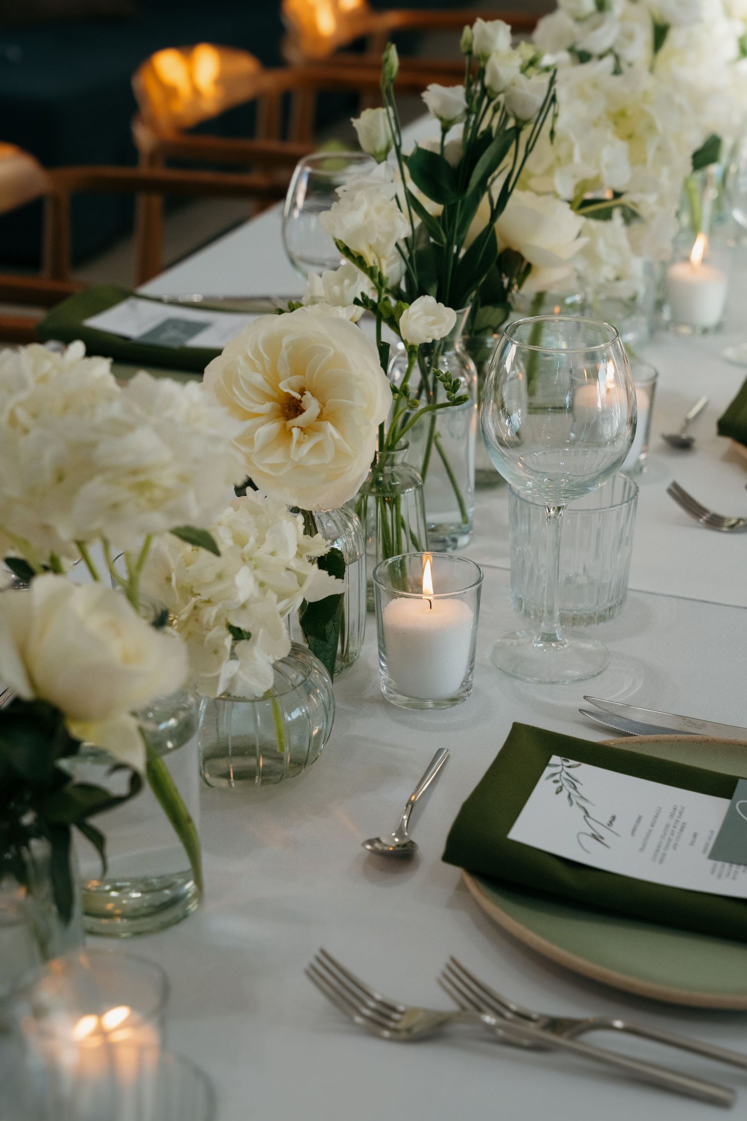 Romantic table setting with white peonies, candlelight, and elegant glassware at Villa Borosso Rethymno, Crete