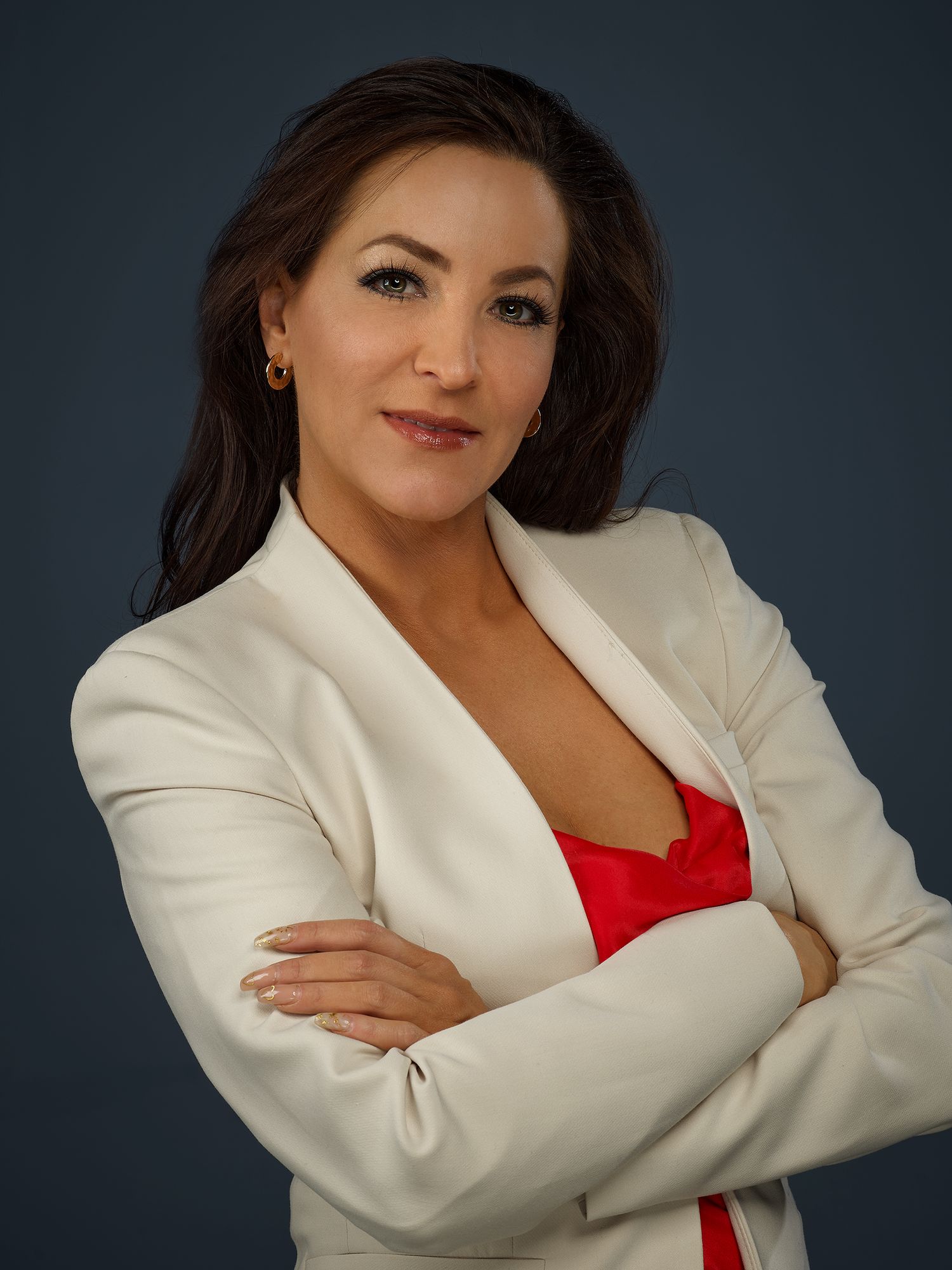 Modern headshot of a woman with a poised and approachable expression
