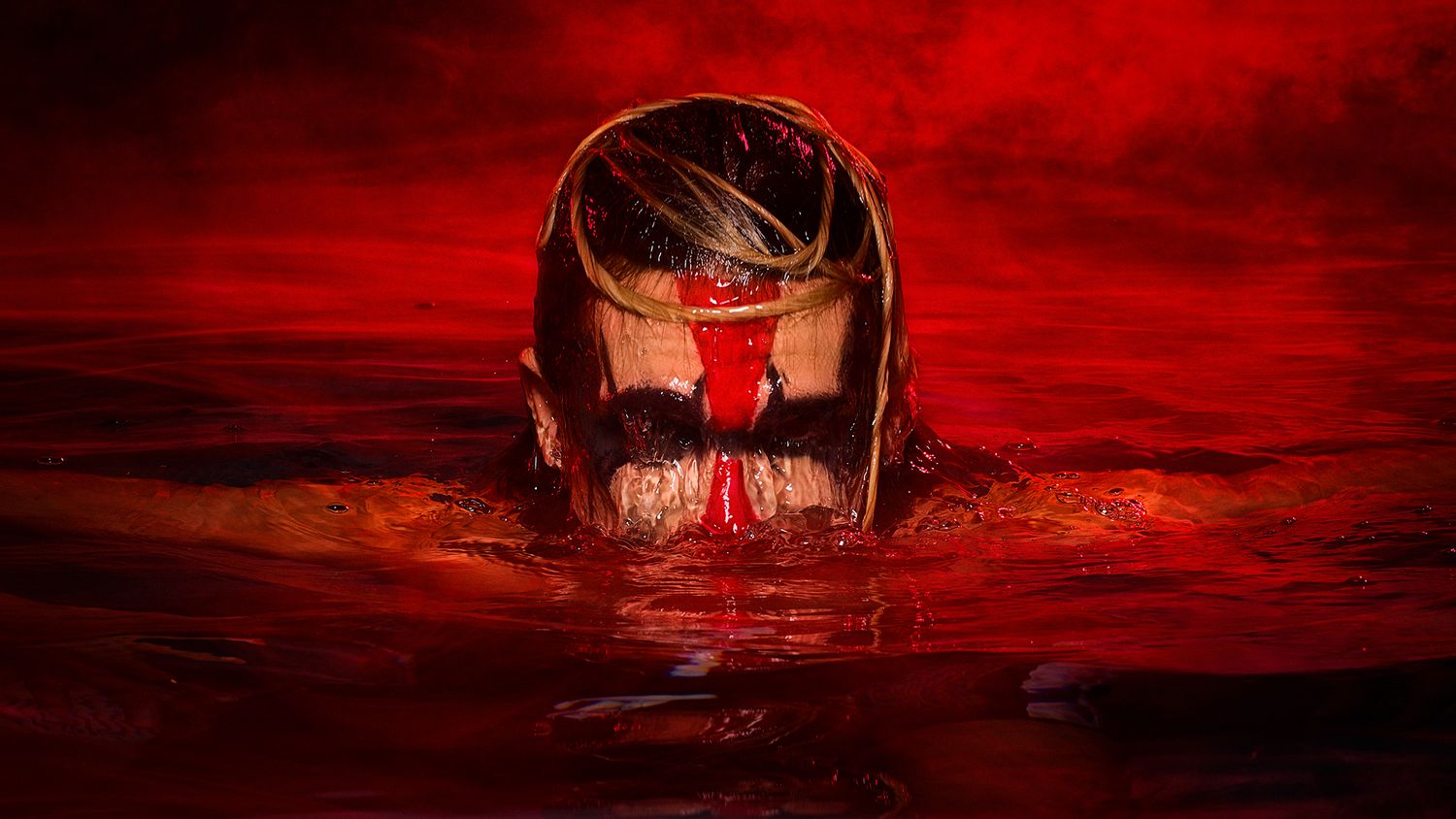 Dark silhouette emerging from blood-red water with dramatic lighting creating an eerie horror atmosphere.