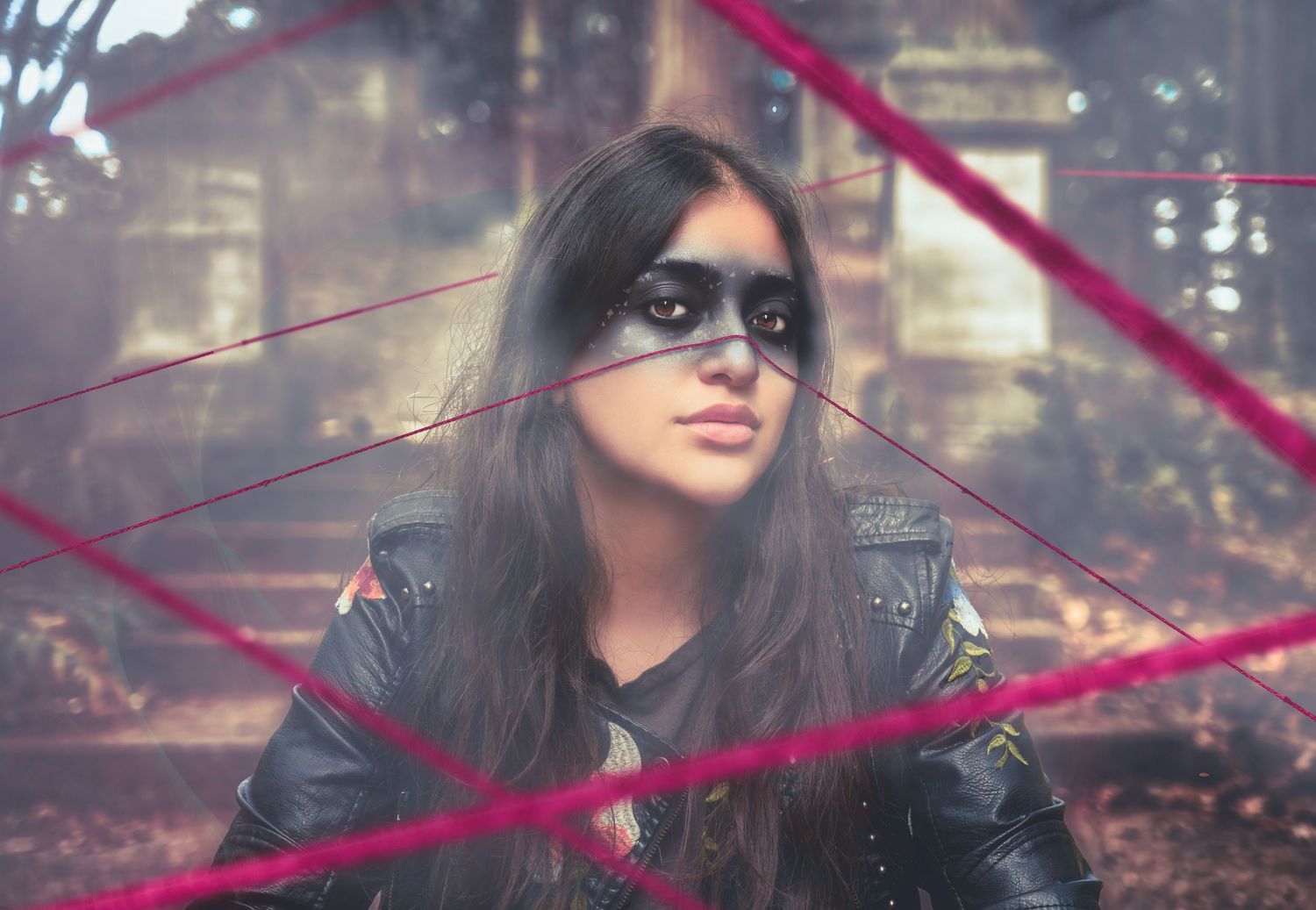 Stylized portrait with red laser lines creating dramatic cyberpunk effect.