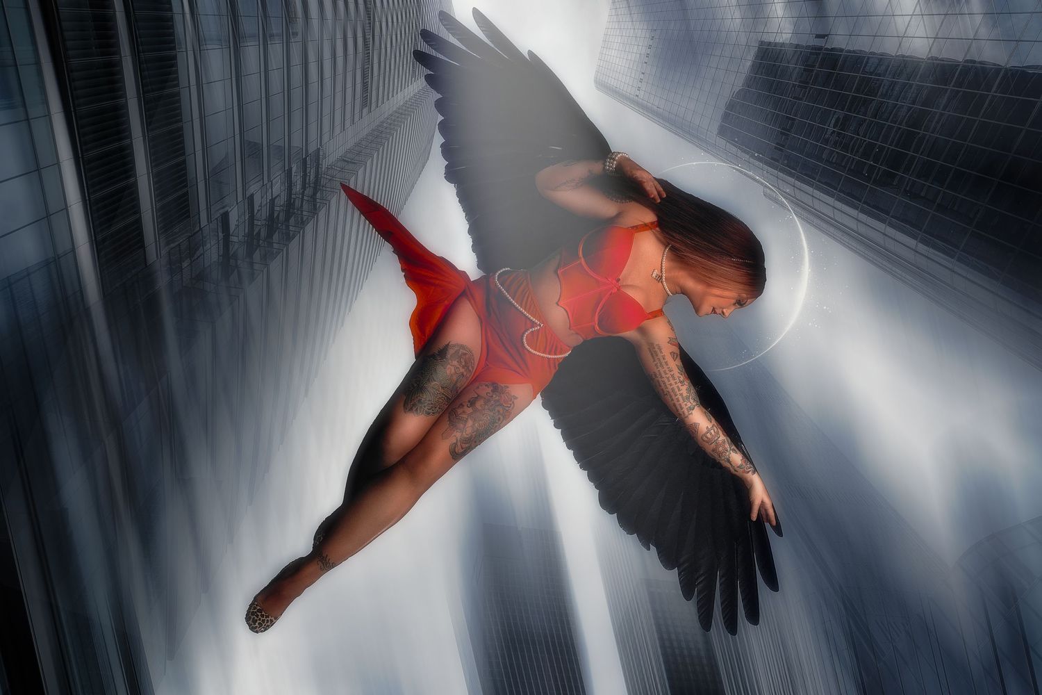 Artistic photo of a figure with dark wings floating between skyscrapers in red attire.