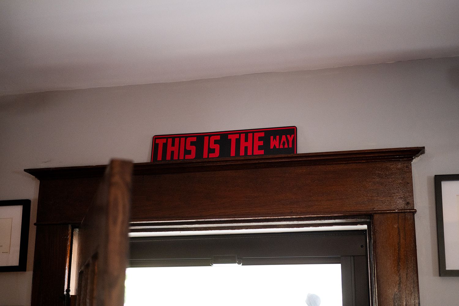 Illuminated red LED sign reading