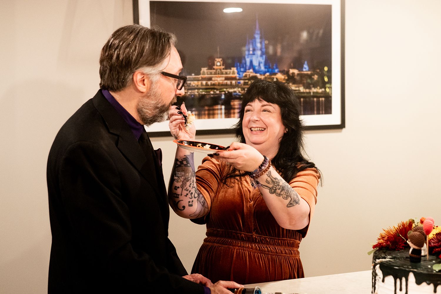 Two people share a candid laughing moment together, captured across multiple frames showing joyful interaction.
