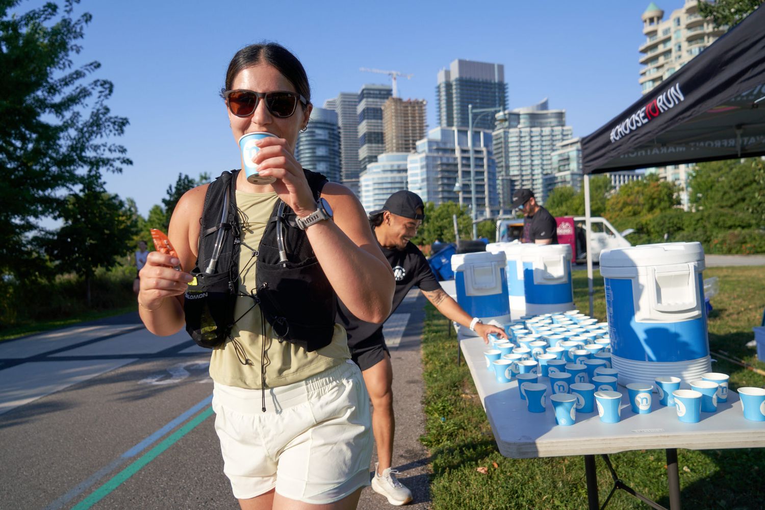 Runners cheering for others in a race in Canada