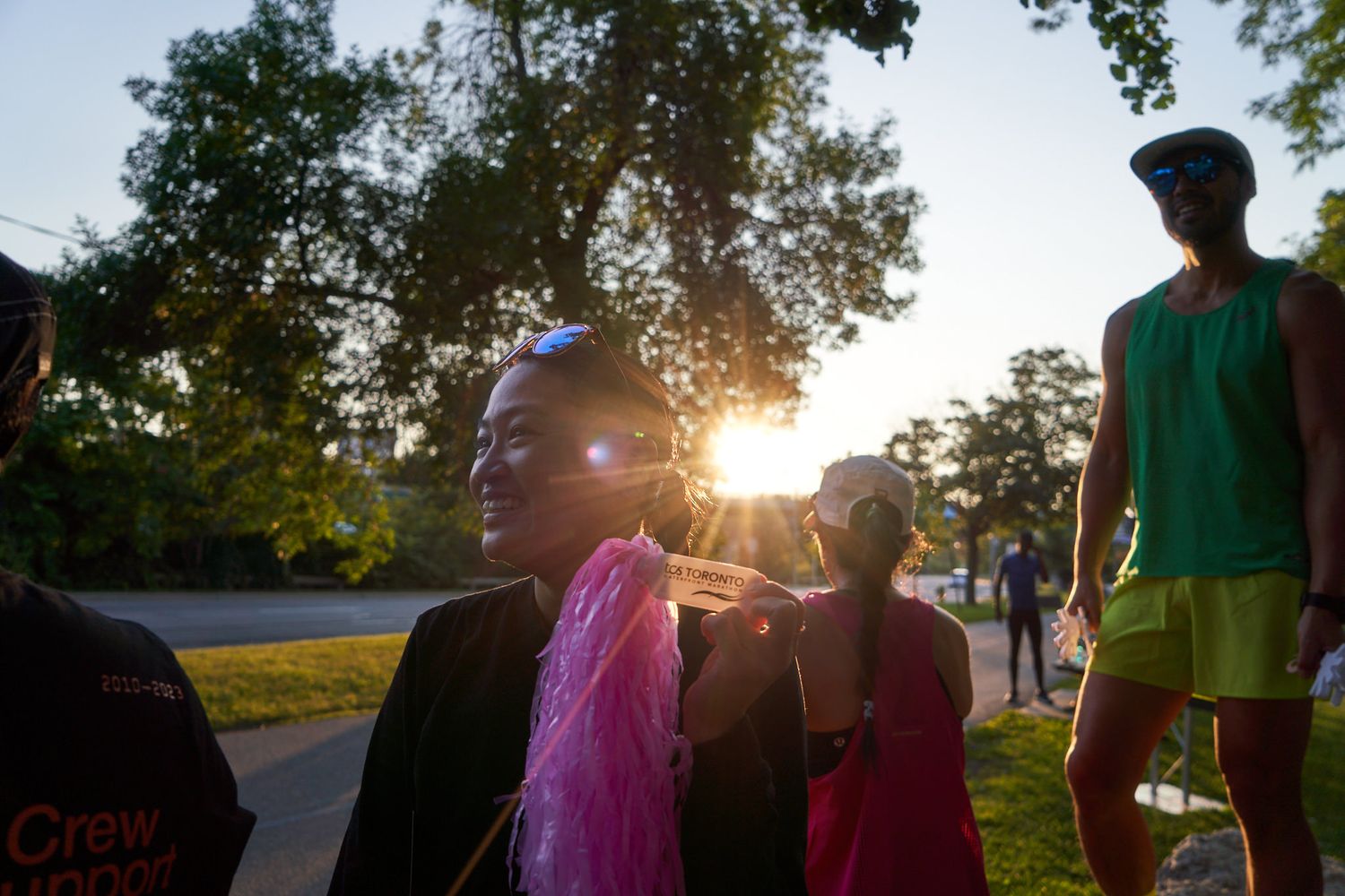 Runners cheering for others in a race in Canada