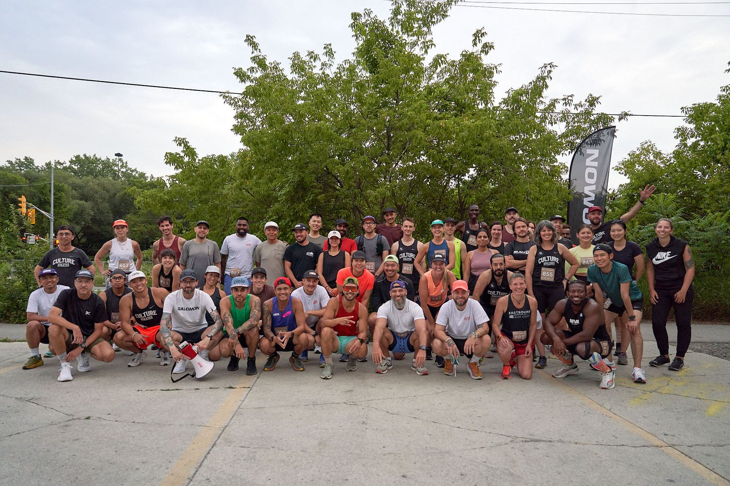 Runners cheering for others in a race in Canada