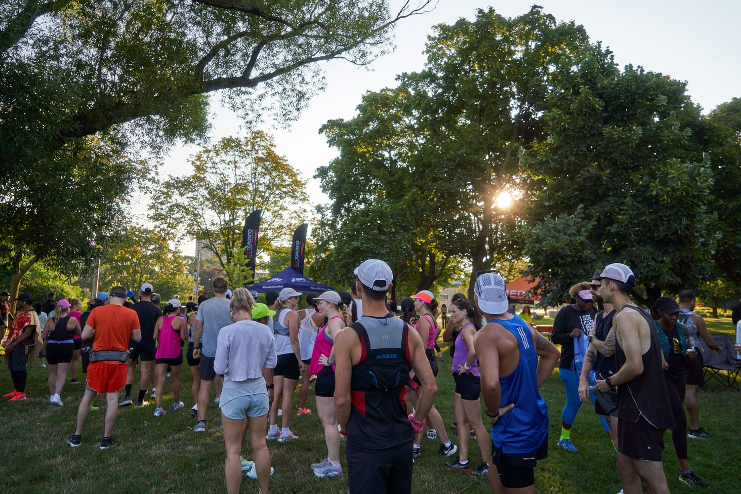 Runners cheering for others in a race in Canada