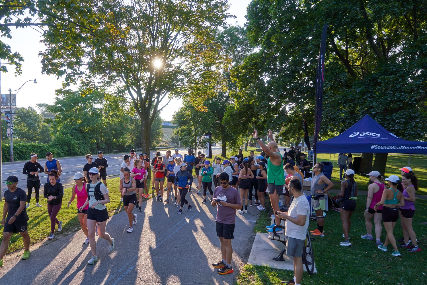 Runners cheering for others in a race in Canada