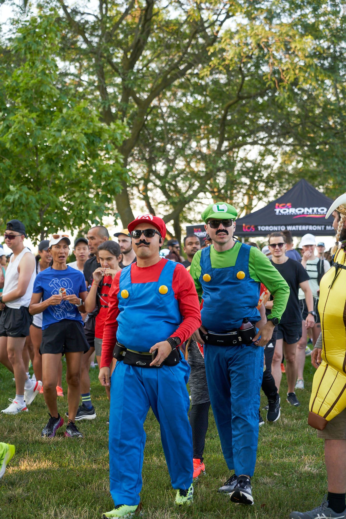 Runners cheering for others in a race in Canada