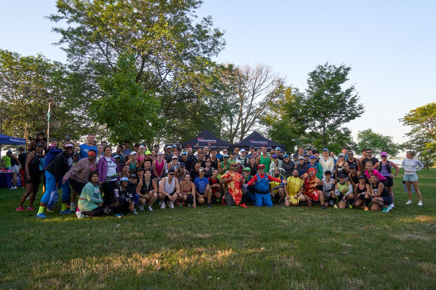 Runners cheering for others in a race in Canada