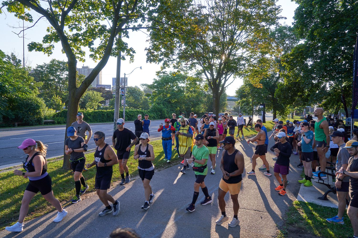 Runners cheering for others in a race in Canada