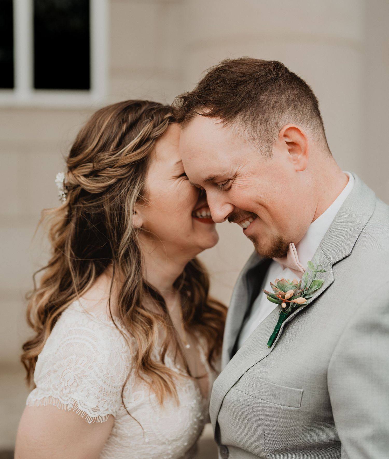 A romantic wedding series showing close-up moments between a couple wearing a white dress and grey suit.