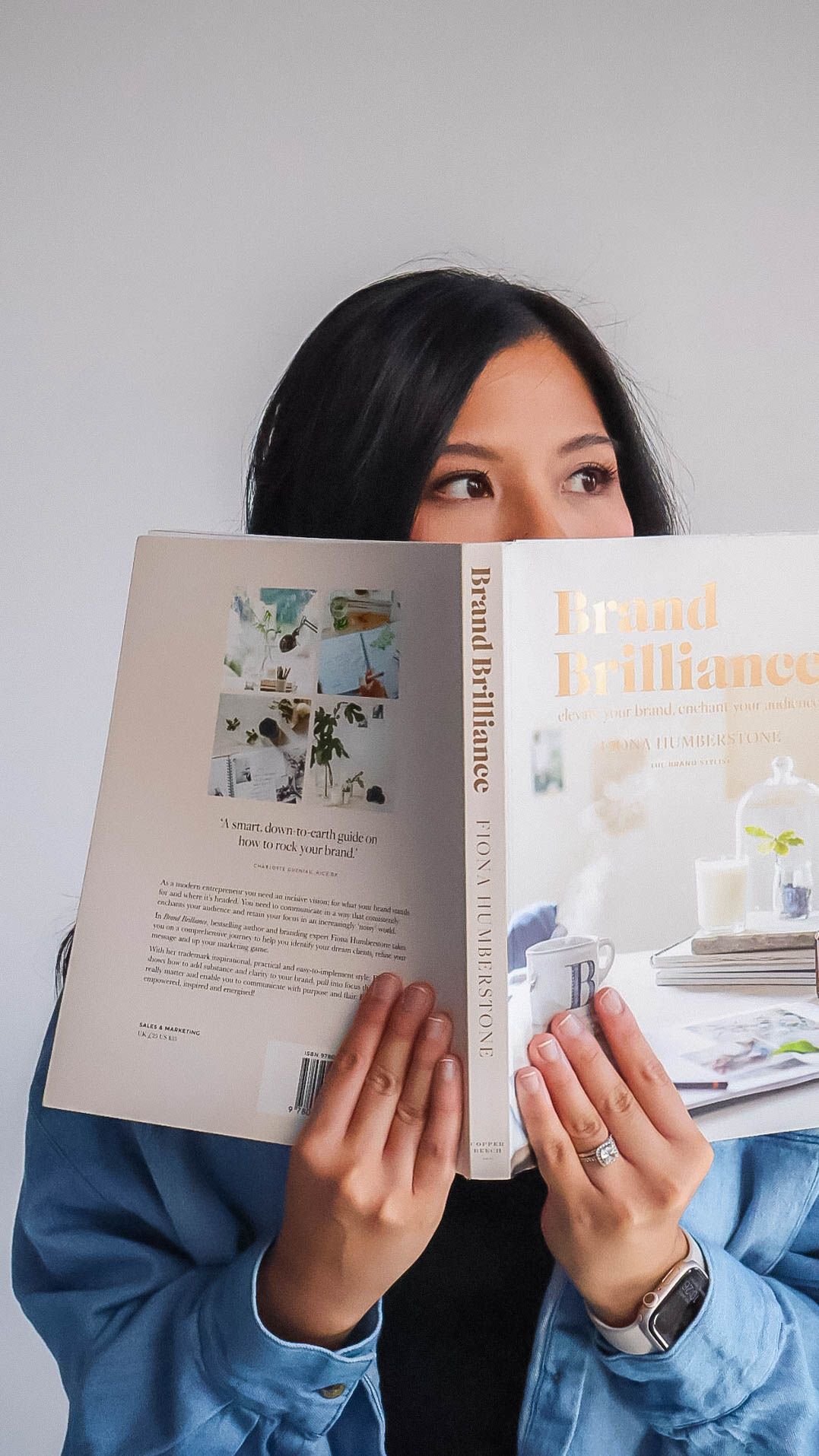 girl holding a book