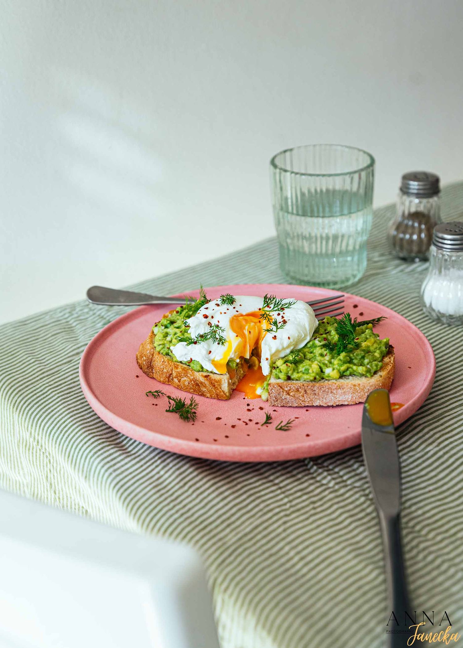 Avocado toast with poached egg on pink plate shown in progressive plating sequence.