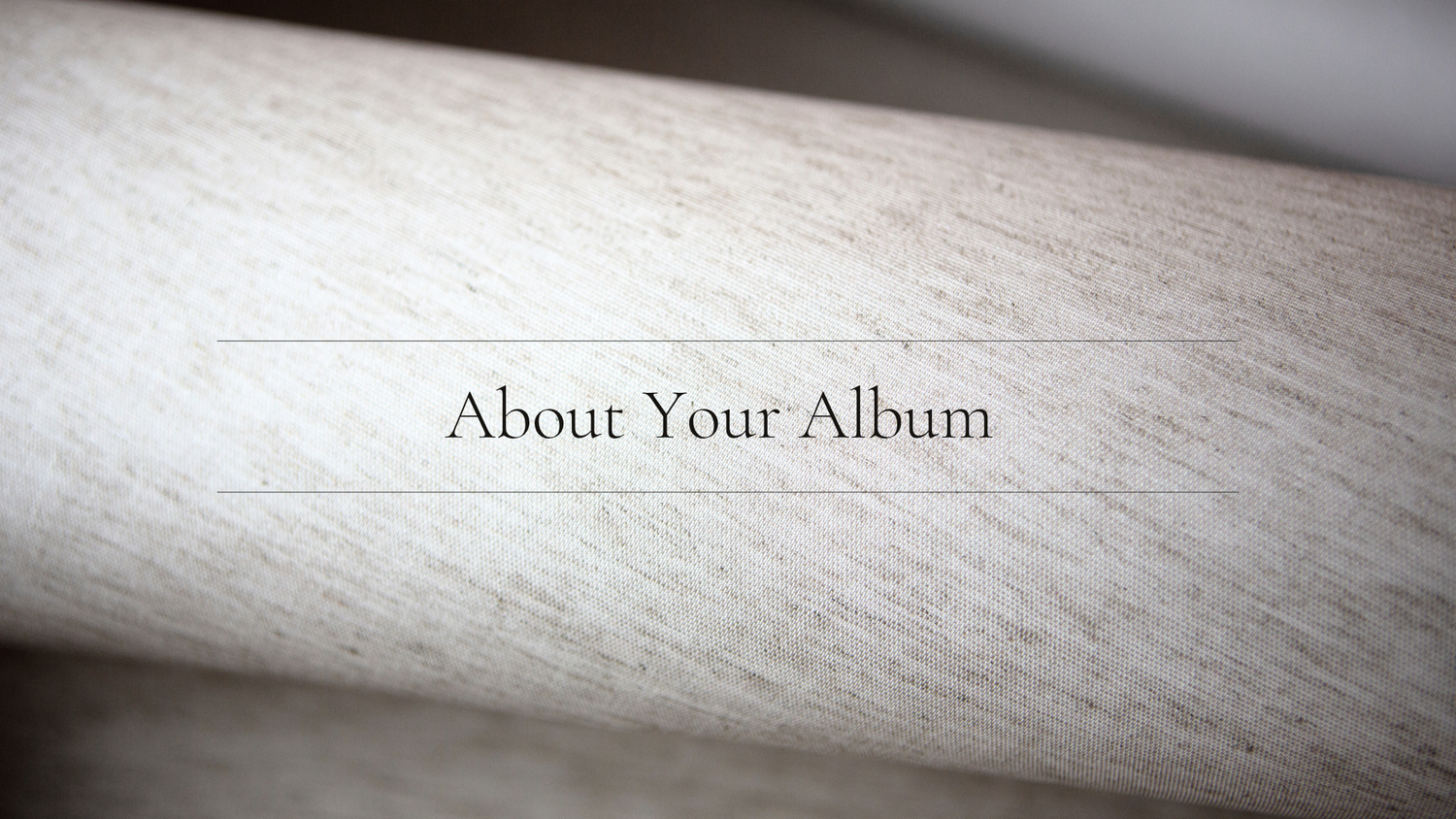 A close-up view of text reading 'About Your Album' printed on a light-colored surface.