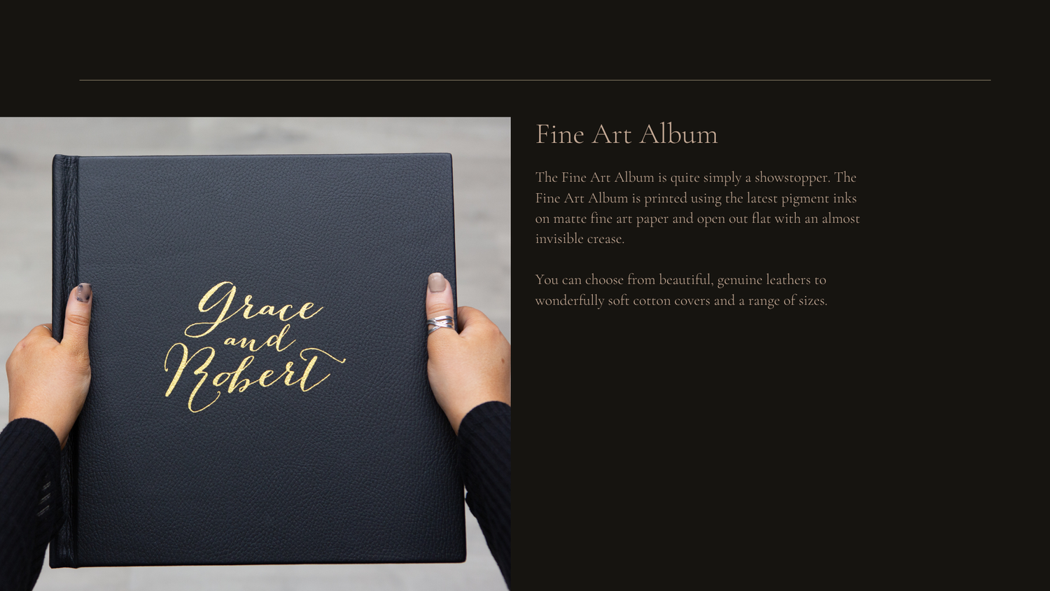 Hands holding an elegant black fine art album with gold script lettering against a dark background.