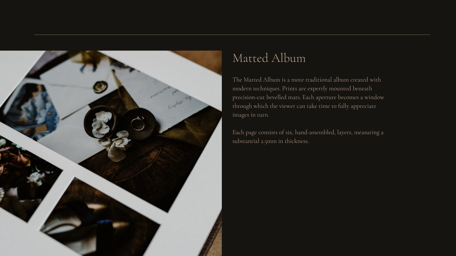 Close-up view of a photo album page showing multiple black and white photographs arranged on a dark background.