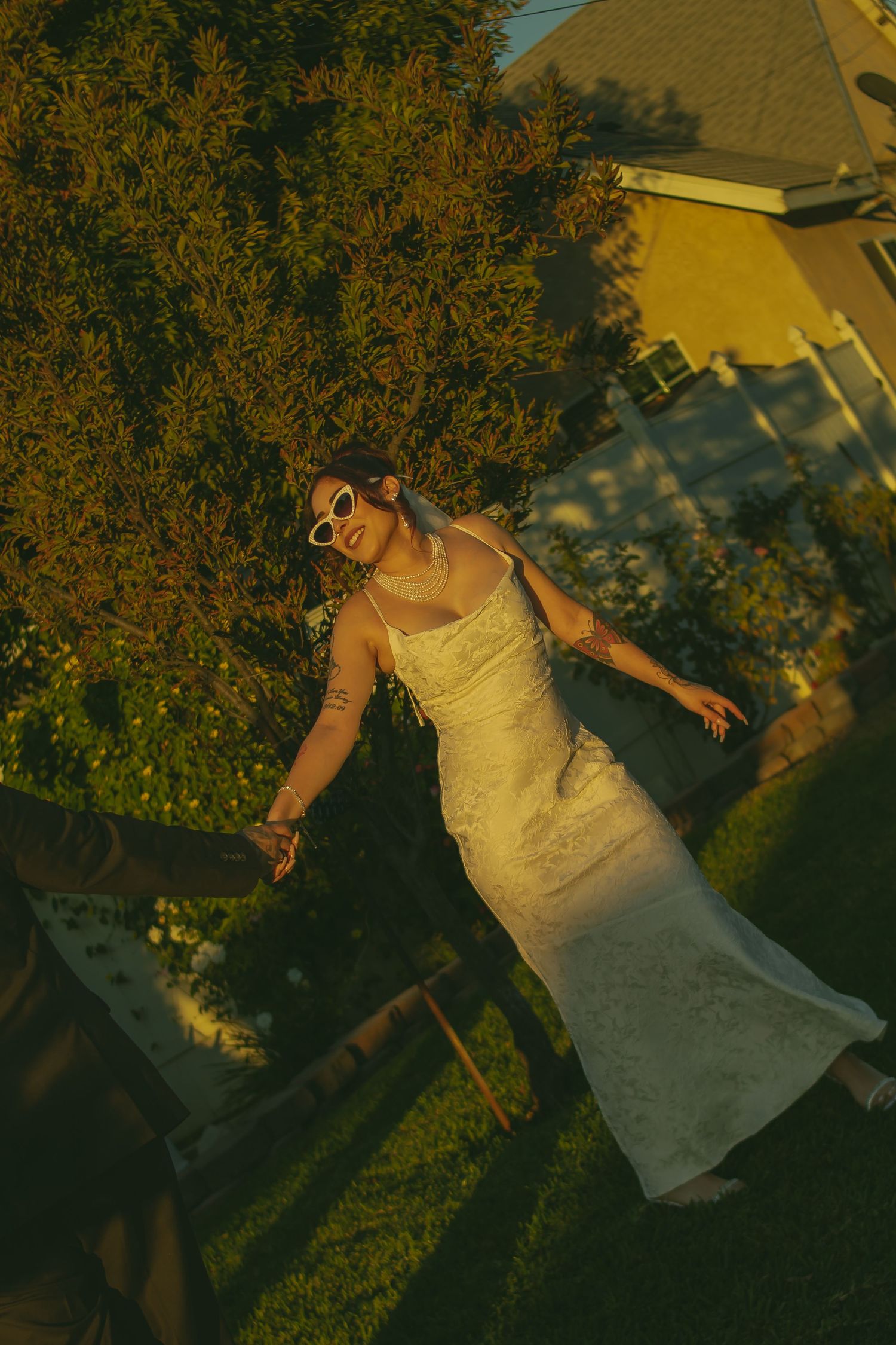 Los Angeles bride celebrating with her new husband in a beautiful garden