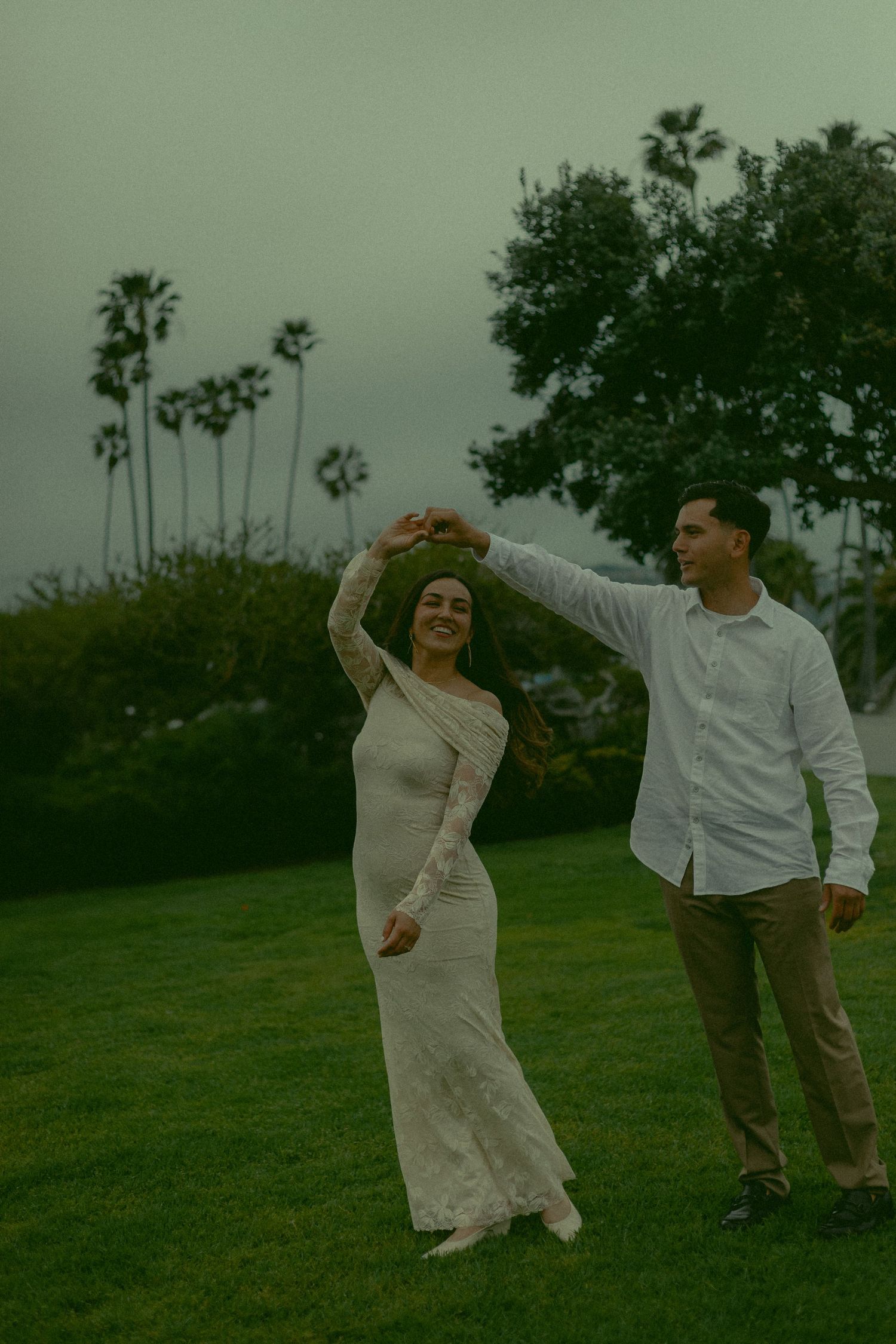 Couple dancing at the beach in Southern California.