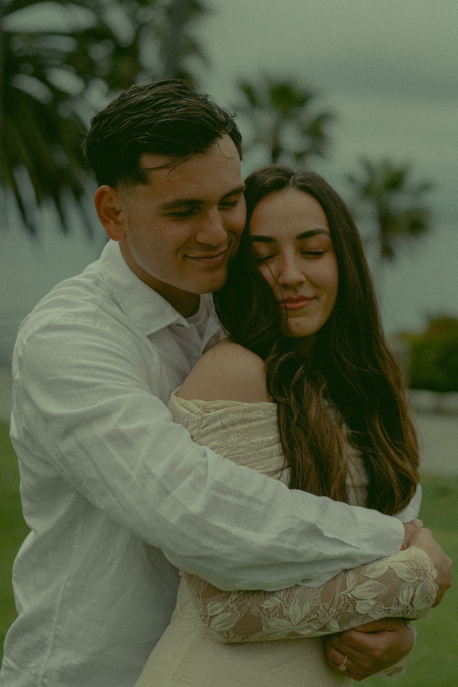 Husband and Wife sharing a loving embrace before they say their vows.