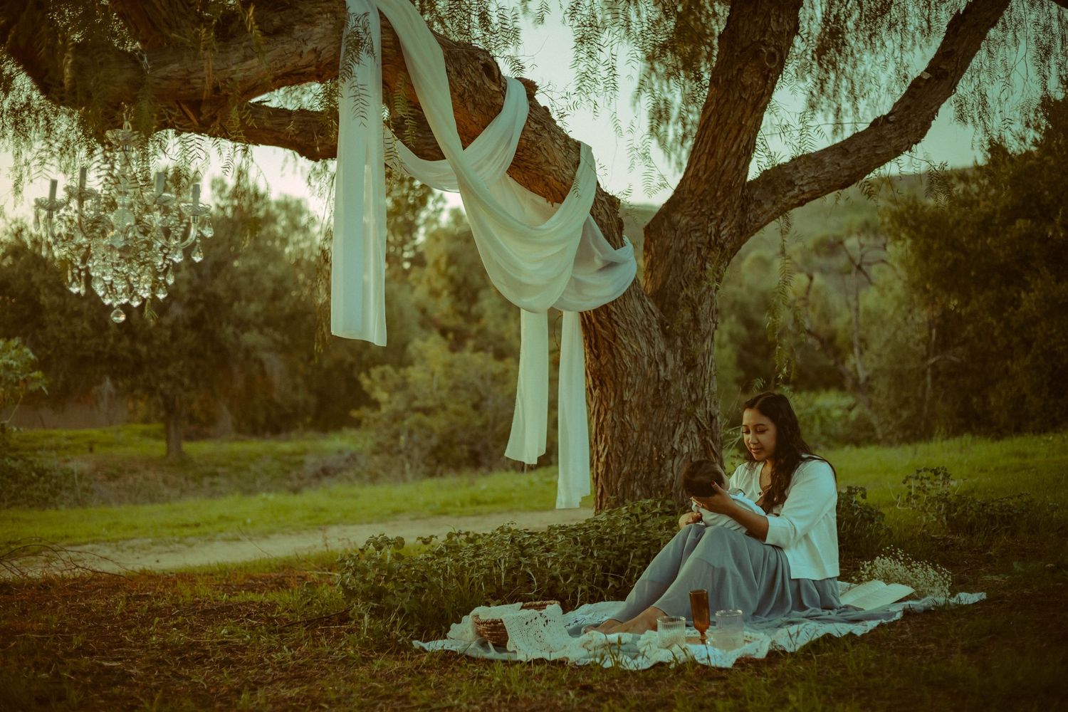 Dreamy Mother's Day photography session with an elegant picnic theme during golden hour near Claremont, California.