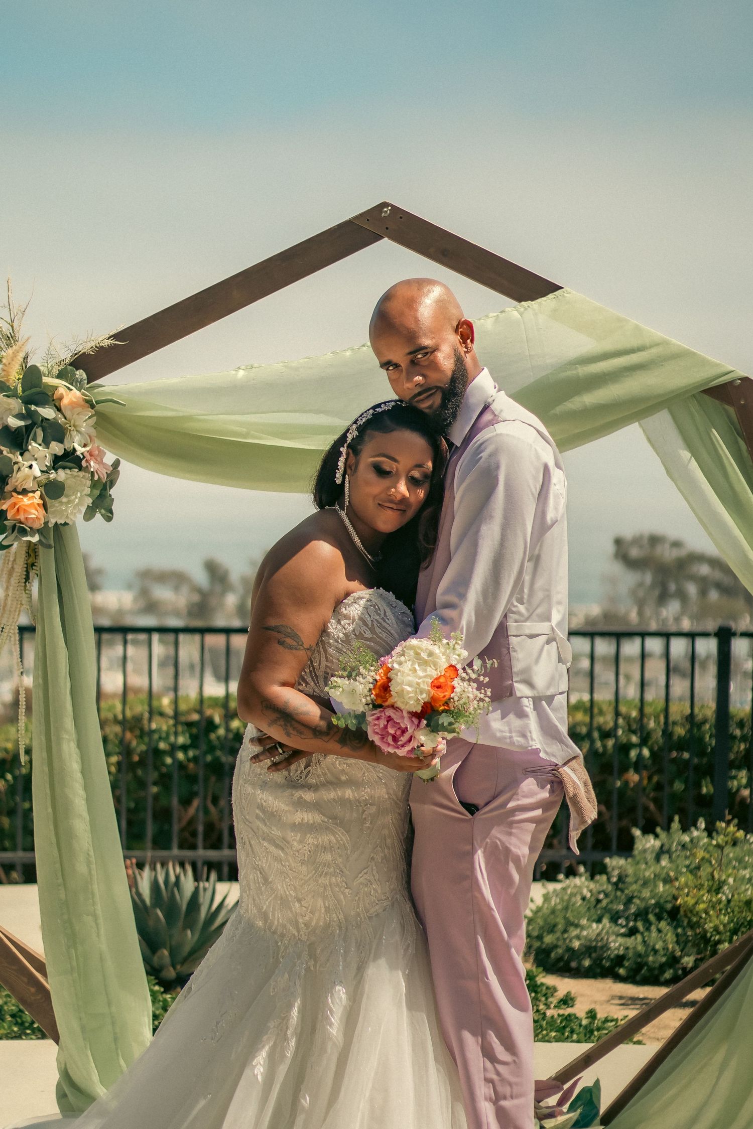 Bride and groom having an intimate embrace enjoying their special day