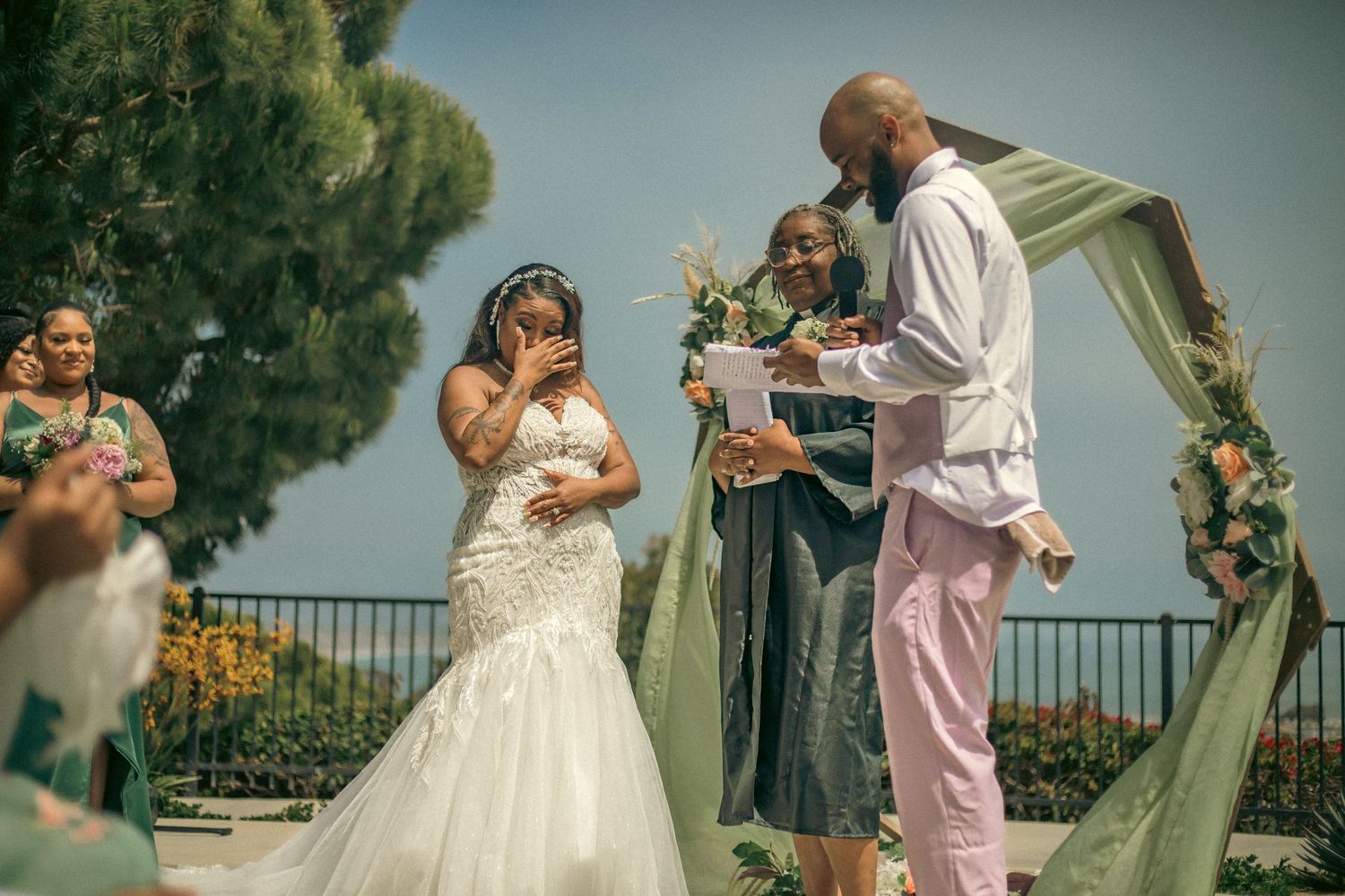Groom giving heartfelt speech that brings bride to tears
