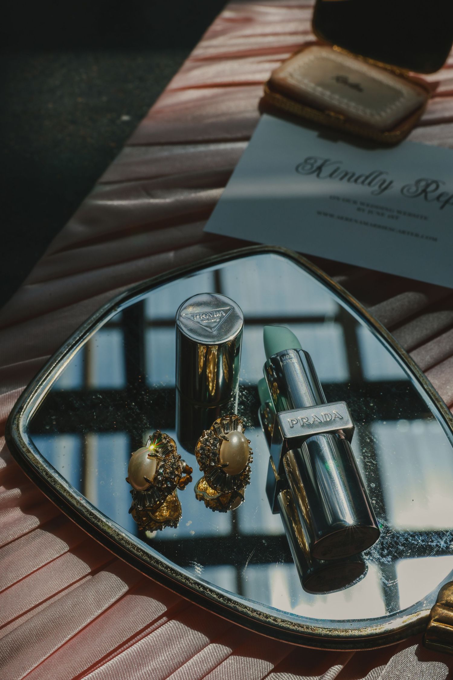 Series of reflective hand mirrors on a wooden surface shows a timelapse effect with vintage charm.