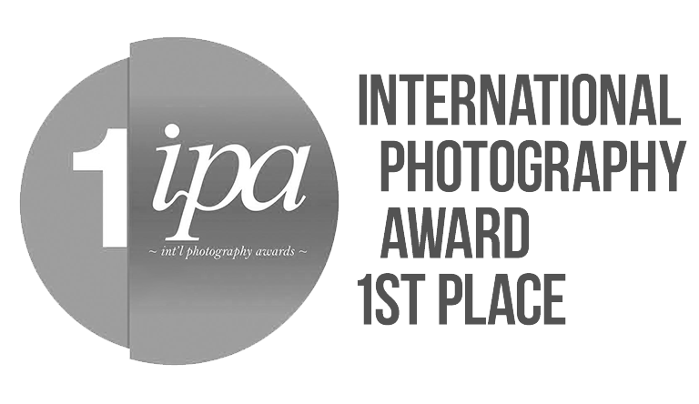 International Photography Award first place circular grey logo design.