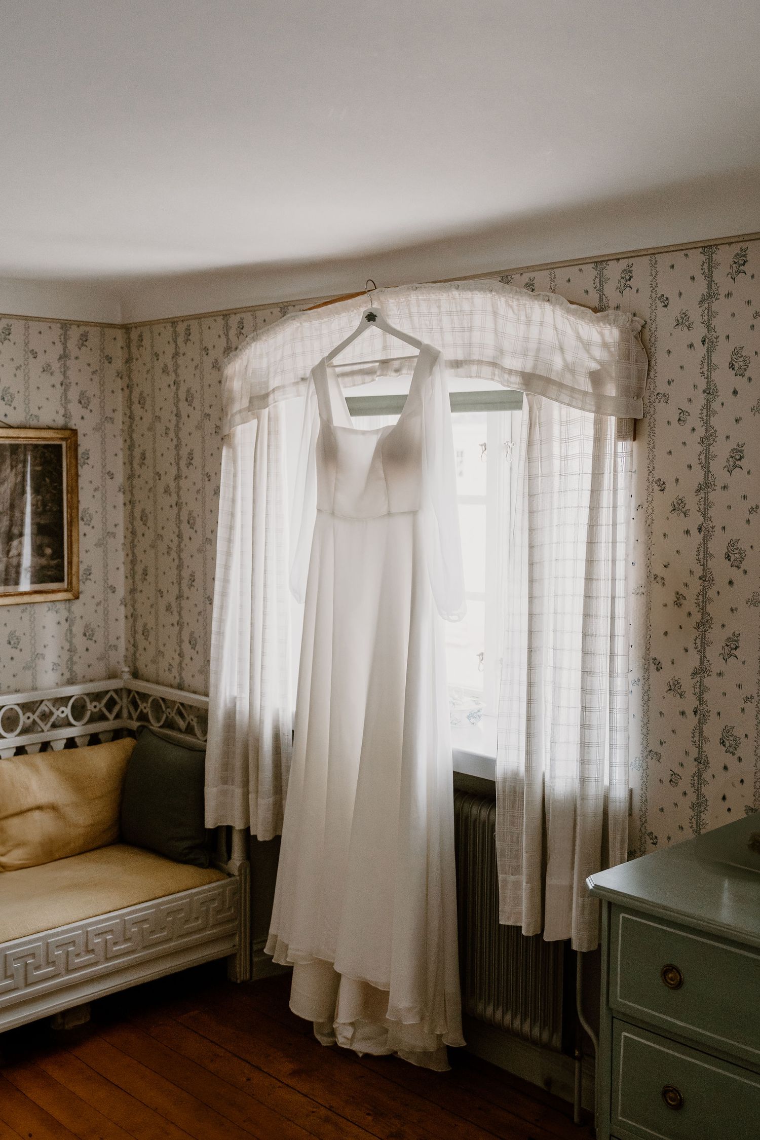 A series of panels showing a vintage room with sheer white curtains, floral wallpaper, and antique furnishings in soft lighting.