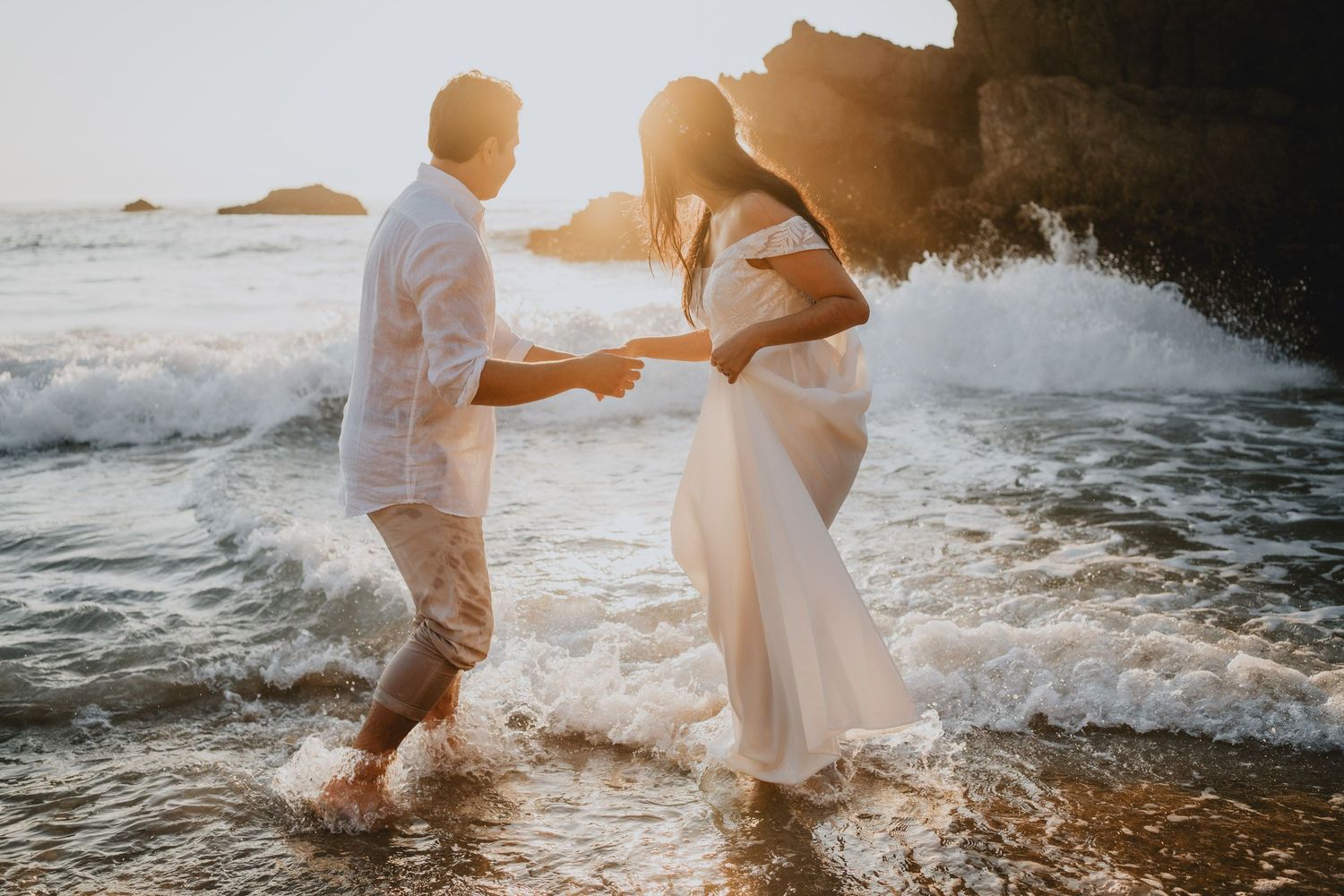 Wandersoul Stories Elopements and Destination Weddings Portugal - Wedding at the beach with sunset in the water