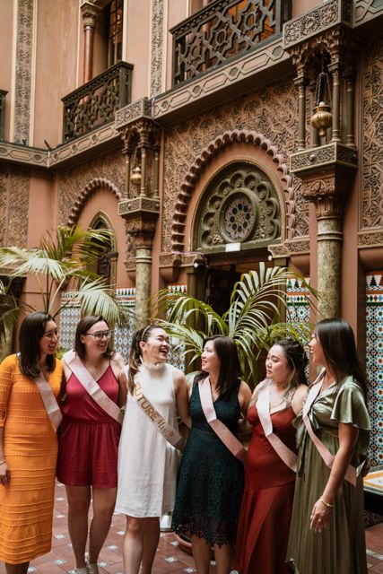 Wandersoul Stories Bachelorette Party Photos - bride laughing with friends in lisbon