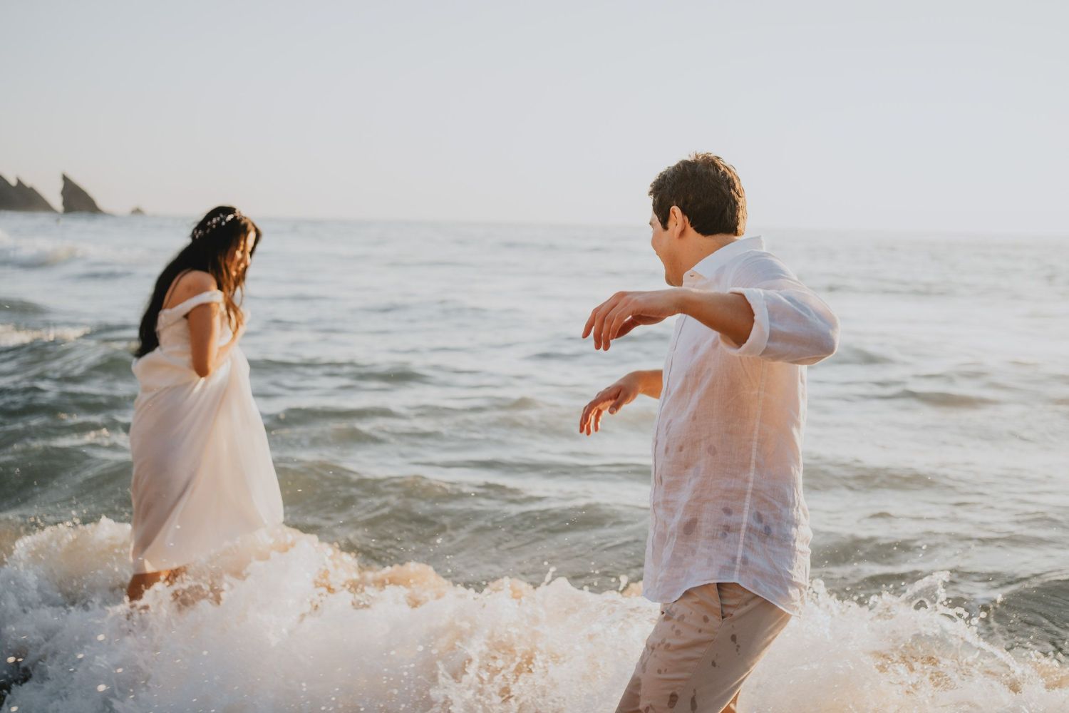 Wandersoul Stories Elopements and Destination Weddings Portugal - Wedding at the beach - couple in the water