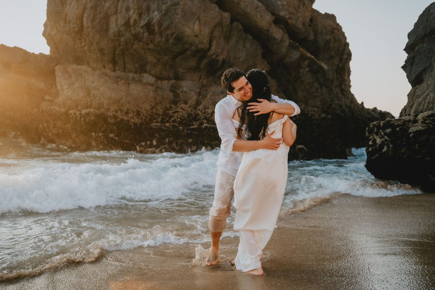 Wandersoul Stories Elopements and Destination Weddings Portugal - Wedding at the beach - couple hugging