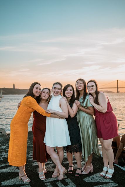Wandersoul Stories Bachelorette Party Photos - bride with friends in lisbon near the river