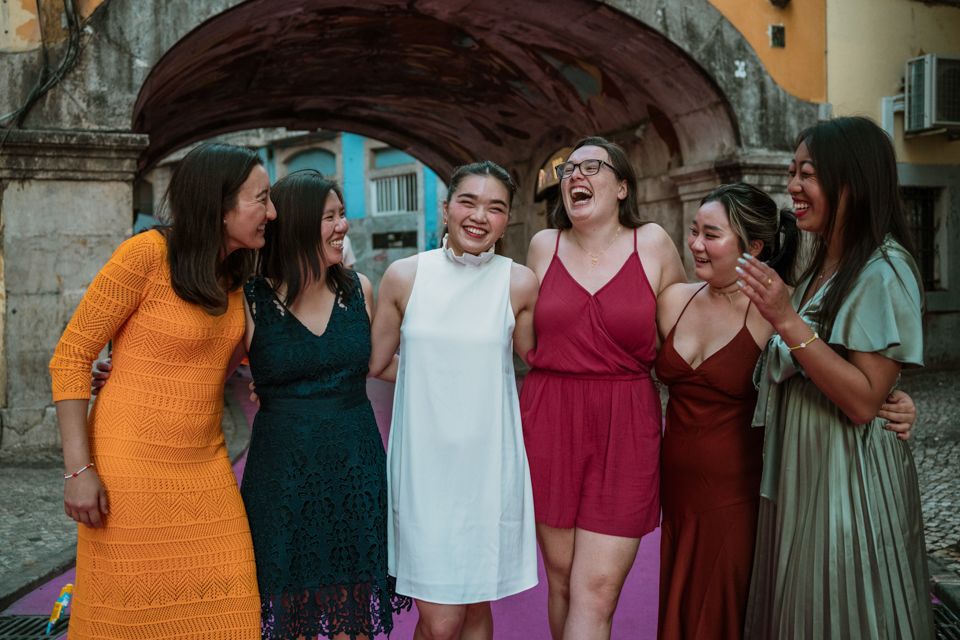 Wandersoul Stories Bachelorette Party Photos - bride with friends in lisbon laughing