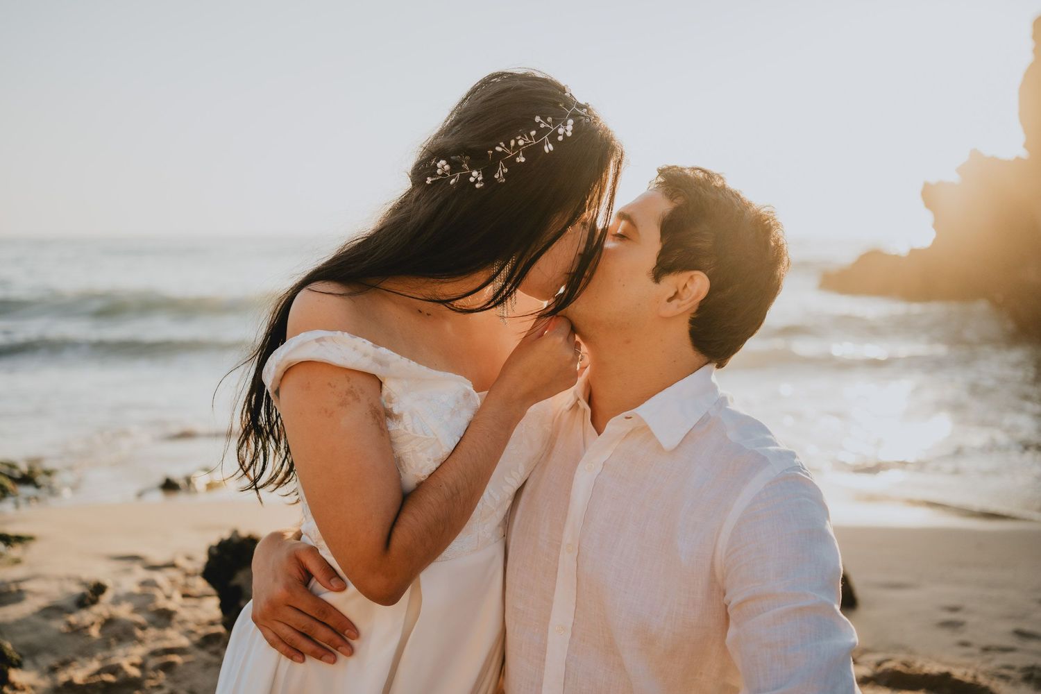 Wandersoul Stories Elopements and Destination Weddings Portugal - Wedding at the beach - couple kissing
