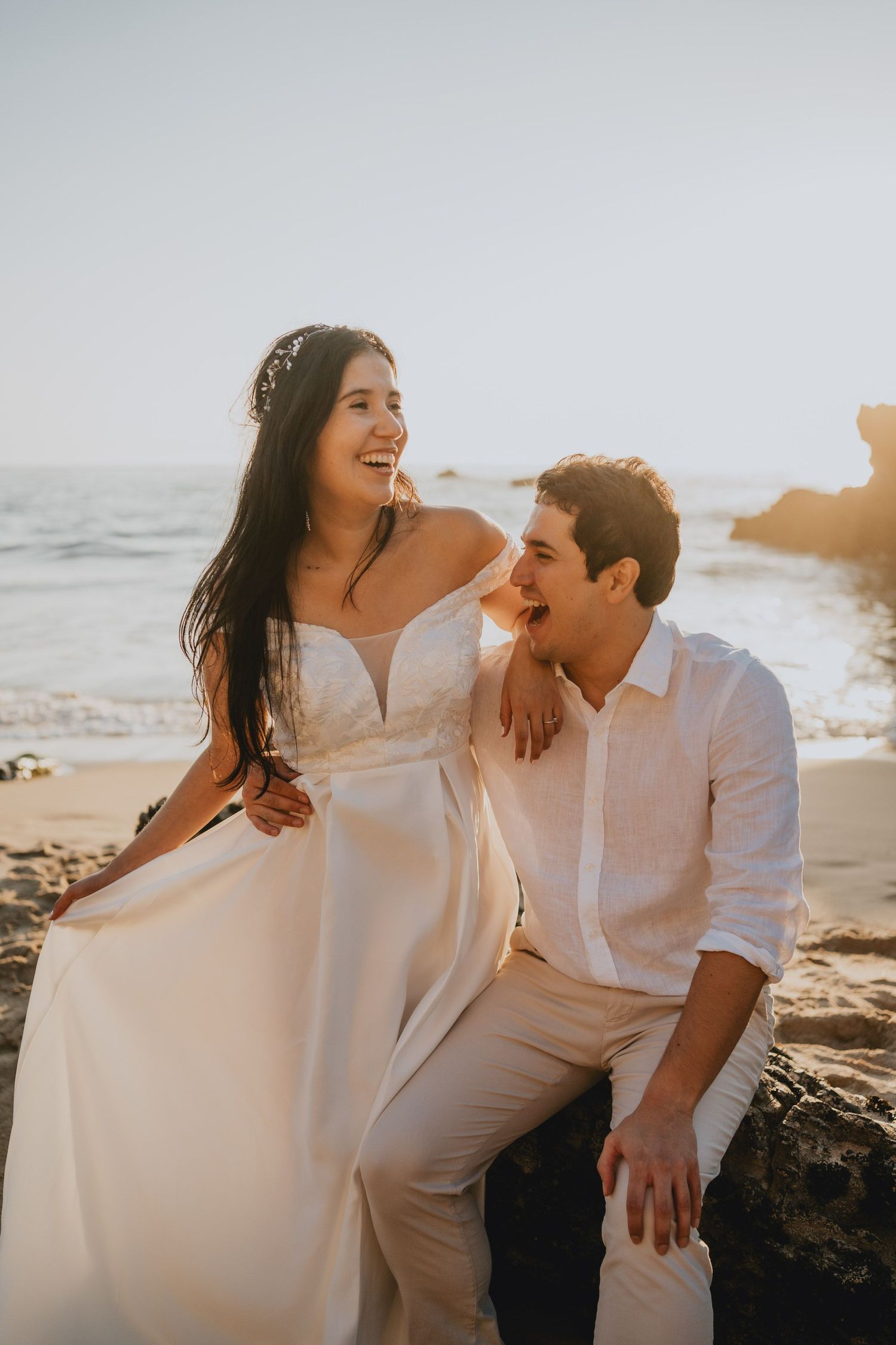 Wandersoul Stories Elopements and Destination Weddings Portugal - Wedding at the beach - couple laughing