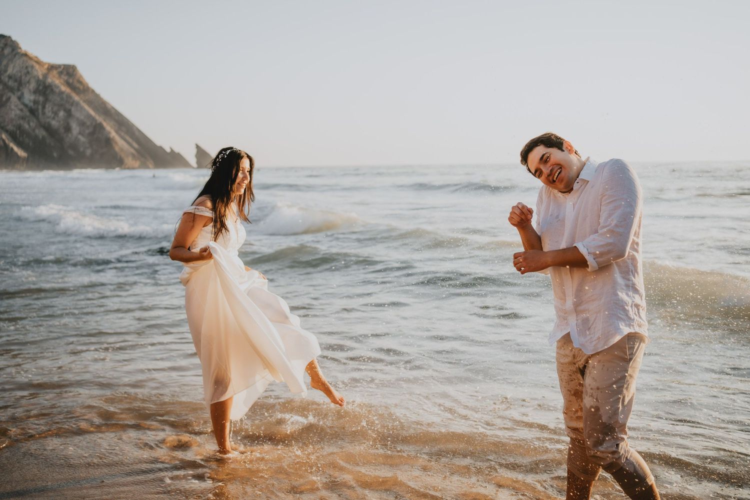 Wandersoul Stories Elopements and Destination Weddings Portugal - Wedding at the beach - couple playing
