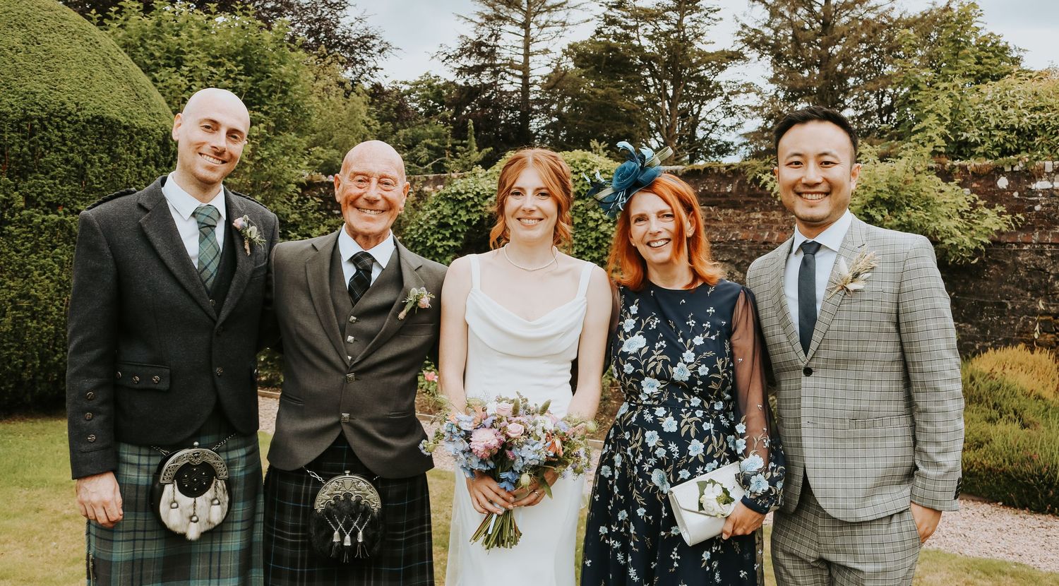 A collection of outdoor wedding photos showing people posing together in a garden setting with natural greenery.