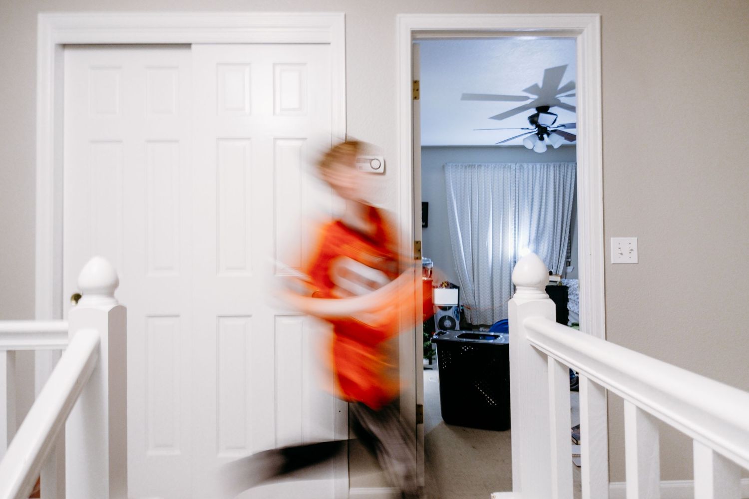 Denver photographer project 365 - blurred portrait of boy playing basketball in hallway
