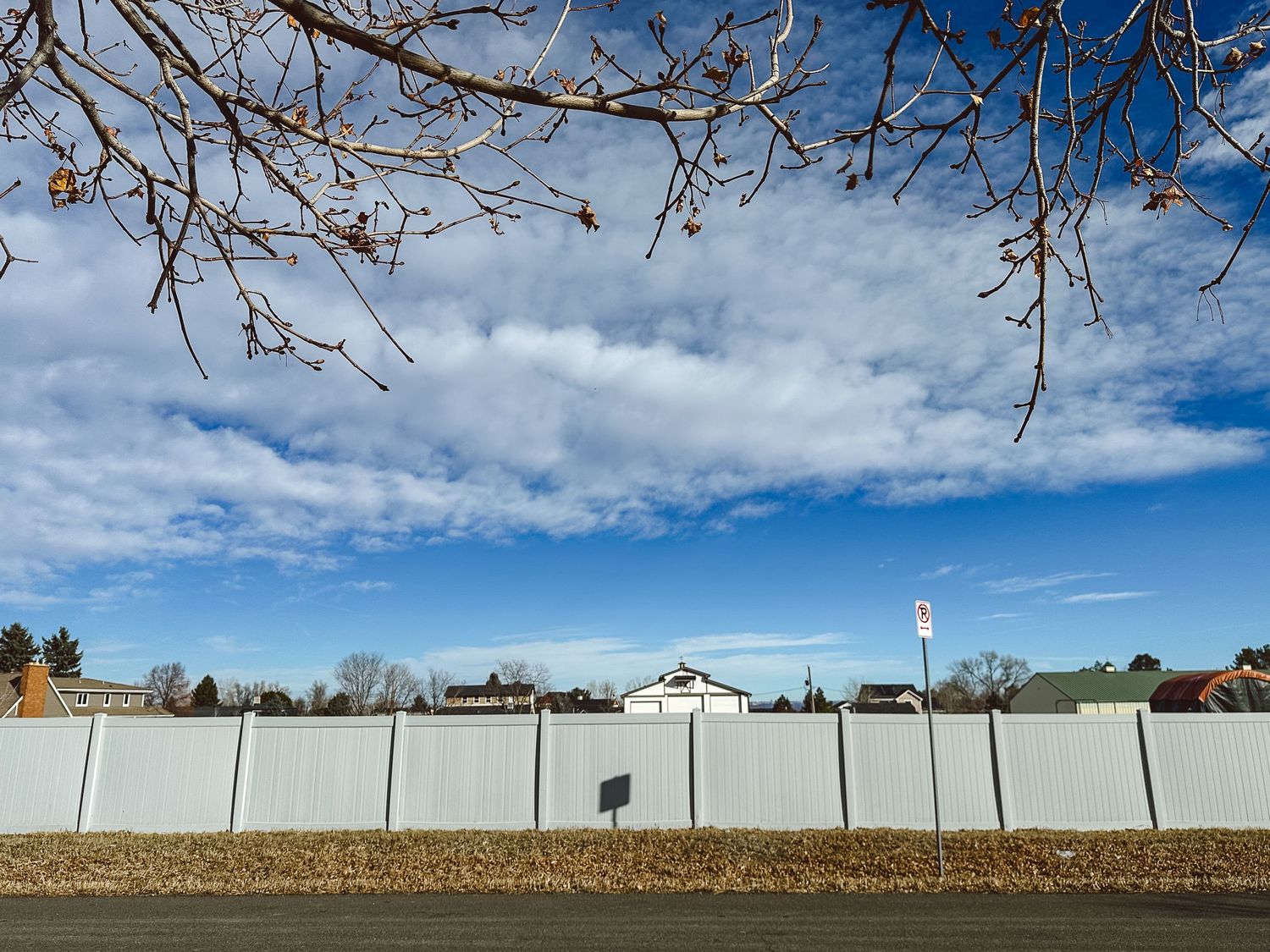 Denver photographer project 365 - white fence, blue skies with clouds and tree branches
