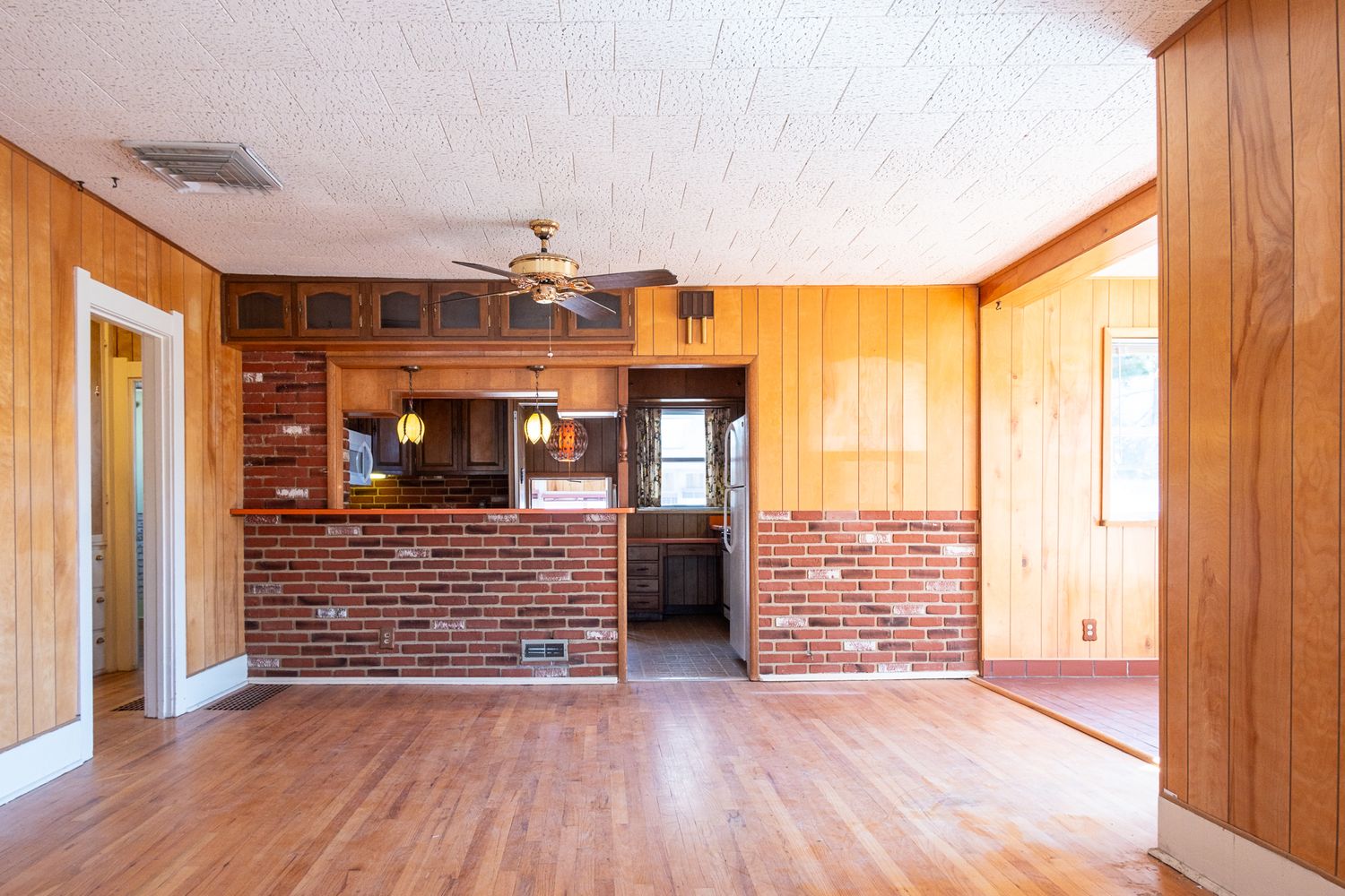 Interior home photo of craftsman style home, with wood and brick.
