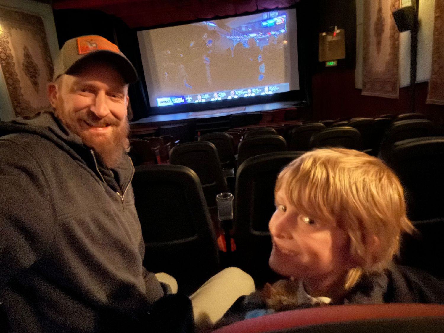Father and son at historic theatre in Estes Park, Colorado.