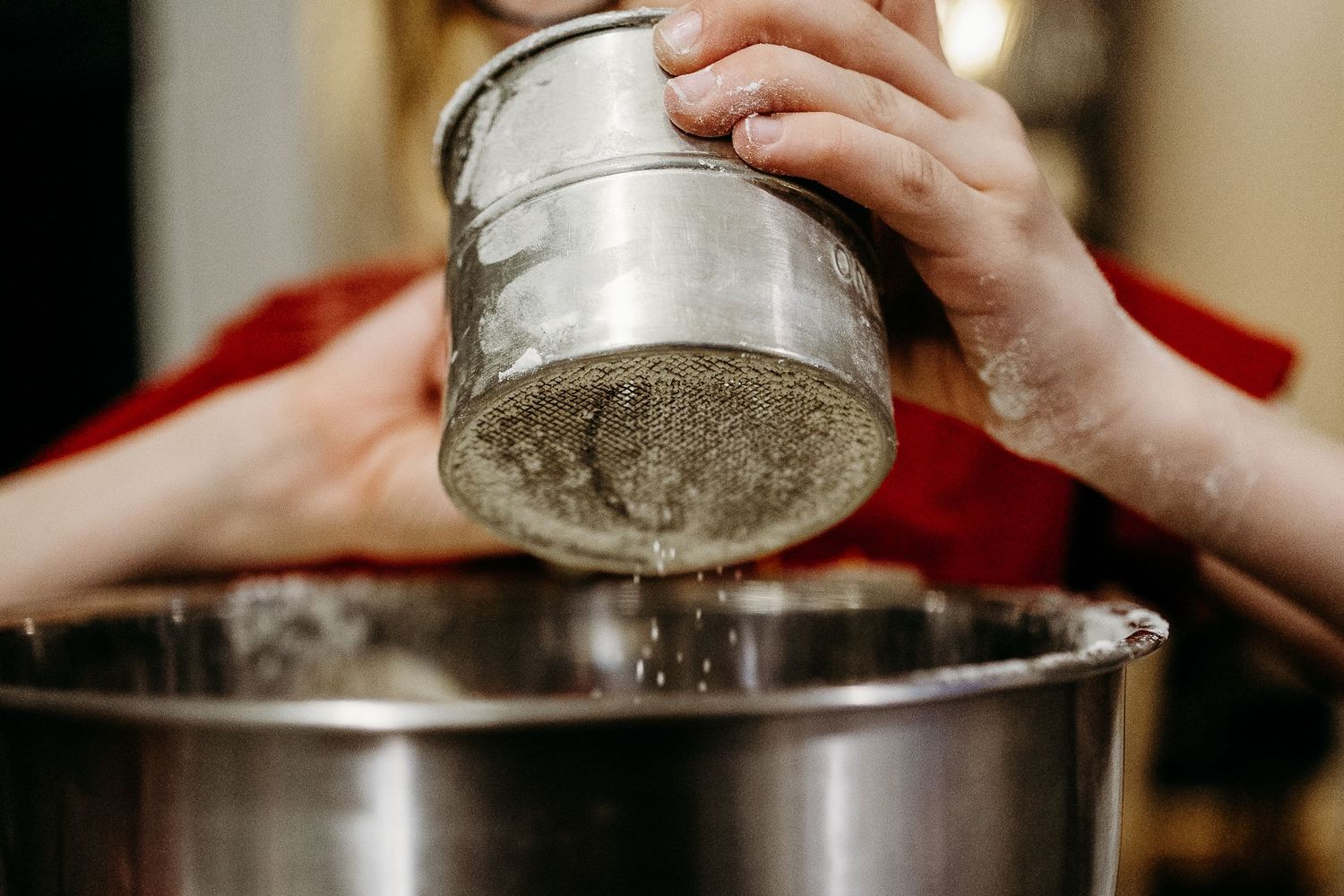 Denver photographer project 365 - close up of child sifting flower with vintage sifter