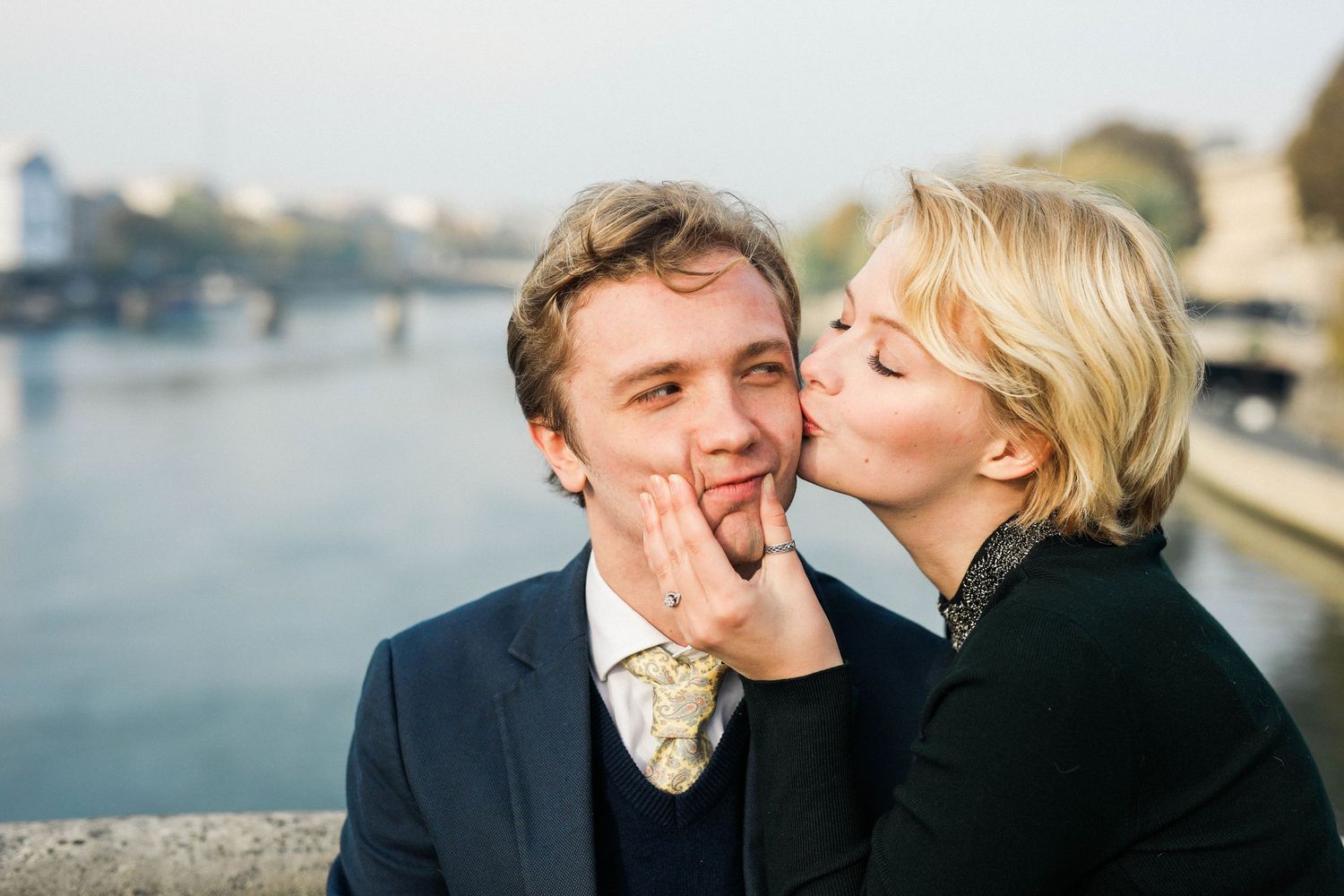 Couple kissing in Paris for engagement shoot