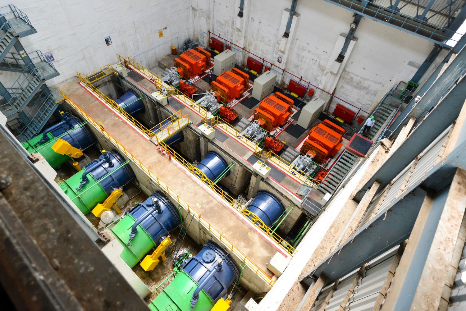 High angle view of industrial electrical equipment and machinery in a facility.
