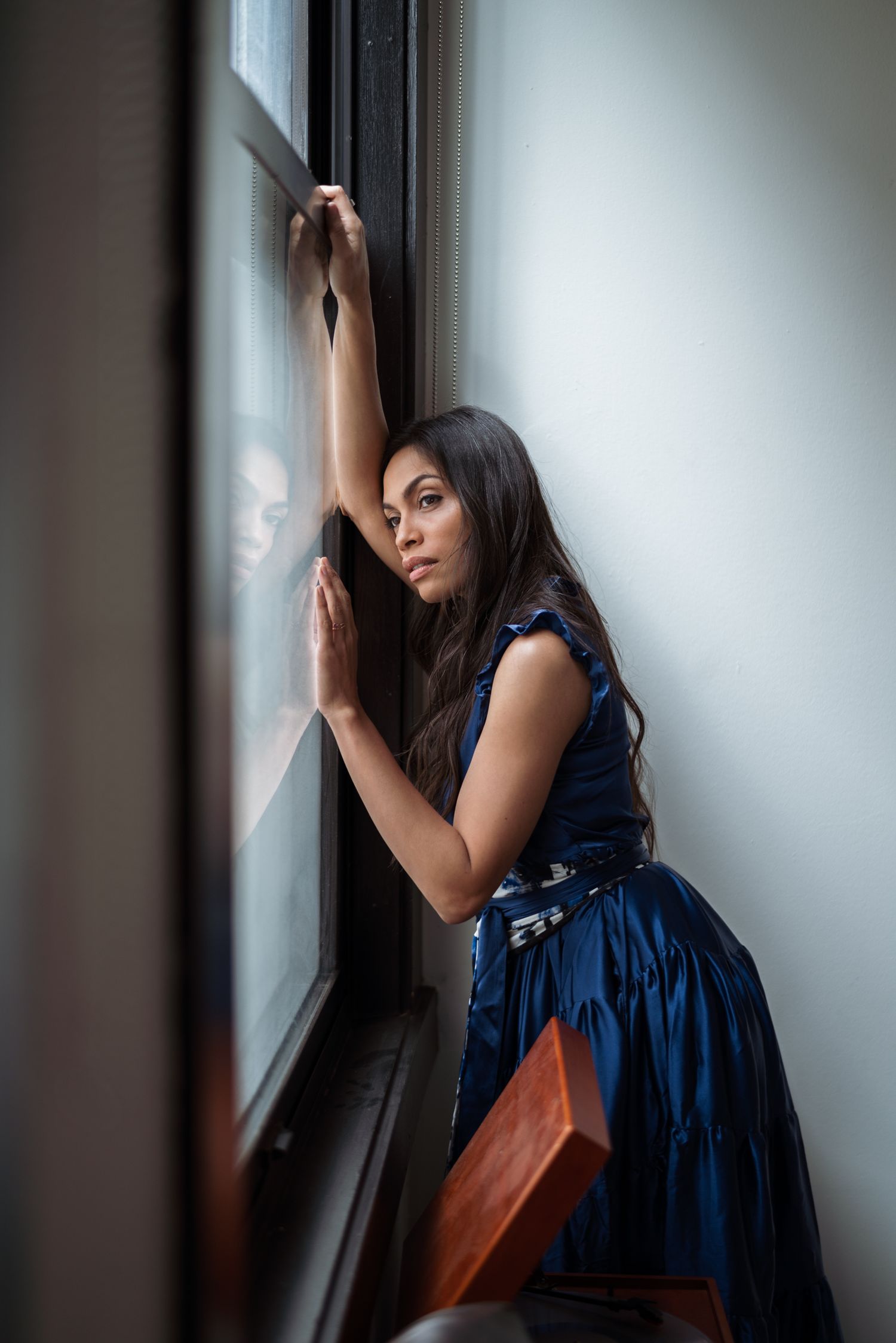Portrait of Actress Rosario Dawson in Studio 189 dress, photographed by Lindy Lin